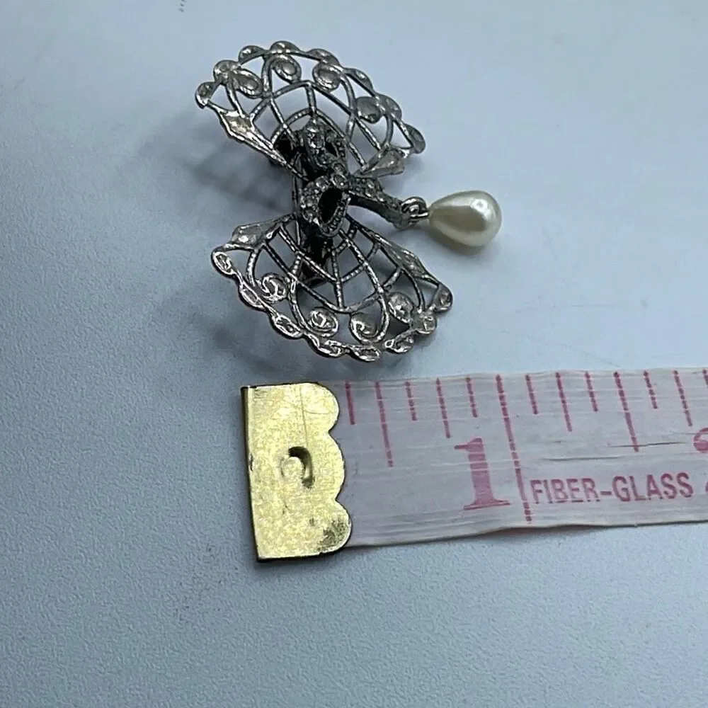 Vintage Bow & rhinestone ribbon with dangle faux pearl.
